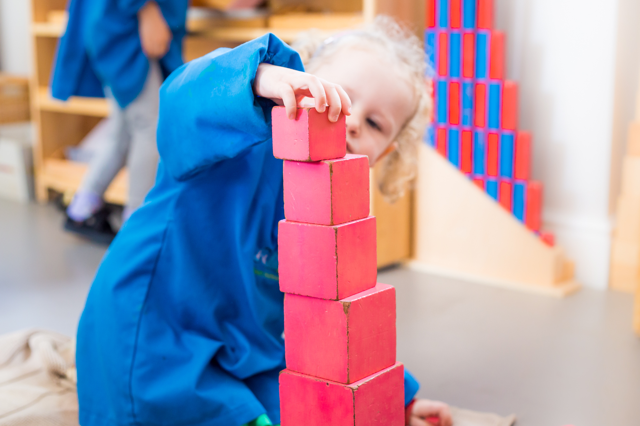 Children engaged in Montessori learning activities